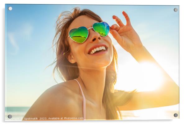 Caucasian girl wearing heart shaped sunglasses on beach Acrylic by Spotmatik 