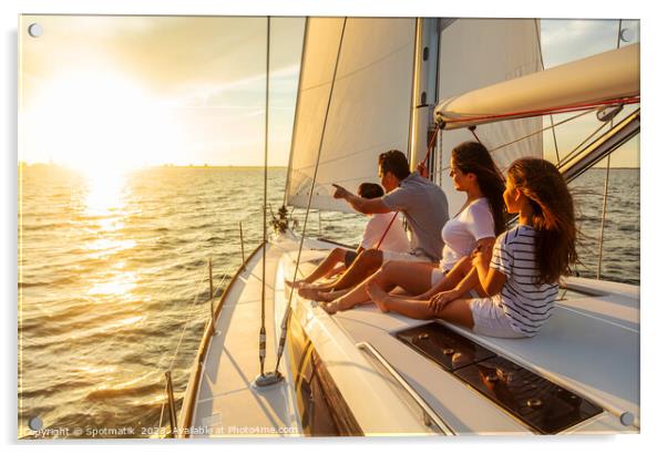 Relaxed family on luxury yacht sailing towards sunset Acrylic by Spotmatik 
