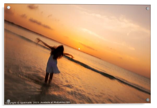 Motion blur girl standing in ocean at sunrise Acrylic by Spotmatik 