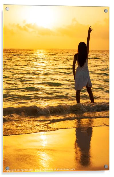 Young Asian woman enjoying ocean sunset on vacation Acrylic by Spotmatik 