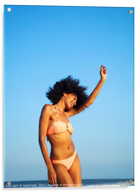 Afro girl in swimwear dancing on the beach Acrylic by Spotmatik 