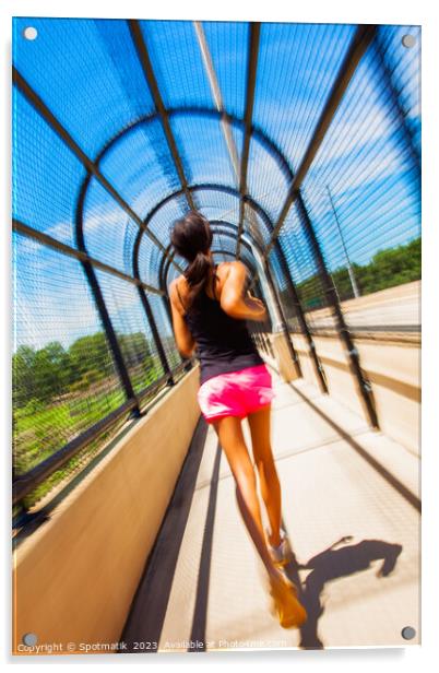 Young African American female jogging along arched walkway Acrylic by Spotmatik 