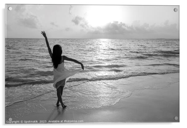 Asian girl with arms outstretched by the ocean Acrylic by Spotmatik 