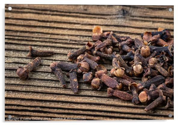 Clove spice on a wooden board, Syzygium aromaticum Acrylic by Lubos Chlubny