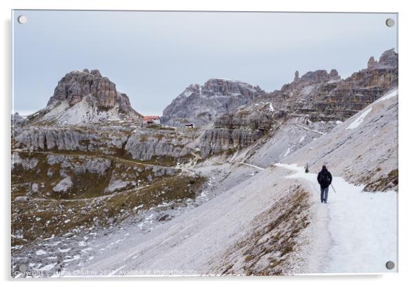 Tourist at Tre Cime di Lavaredo track on winter season. National Park Tre Cime di Lavaredo, Dolomite Alps mountains, Trentino Alto Adige region, Dolomites, Italy Acrylic by Lubos Chlubny
