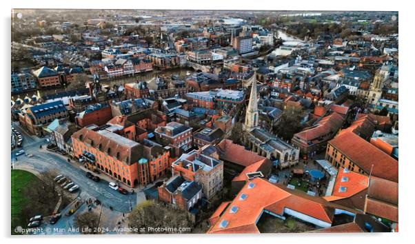 Aerial view of a historic town at dusk with warm lighting, showcasing the urban architecture and streets in York, North Yorkshire Acrylic by Man And Life