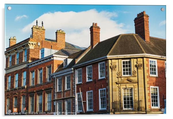 Historic brick buildings with classic British architecture under a clear blue sky in York, UK. Acrylic by Man And Life