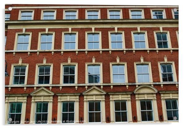 Facade of a classic red brick building with symmetrical windows against a clear sky in Leeds, UK. Acrylic by Man And Life