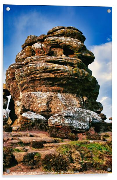 Majestic rock formation under blue sky with clouds, showcasing natural erosion and geological layers at Brimham Rocks, in North Yorkshire Acrylic by Man And Life