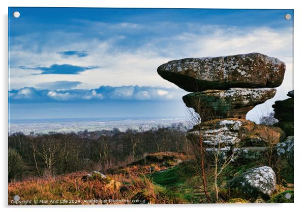 Scenic view of a unique rock formation in a lush landscape with dramatic clouds in the sky at Brimham Rocks, in North Yorkshire Acrylic by Man And Life