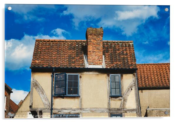 Old European house with half-timbered walls and a red tiled roof against a blue sky with clouds. Vintage architecture with visible wear and character in York, North Yorkshire, England. Acrylic by Man And Life