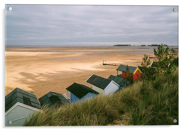 Beach huts and sunlit view out to sea. Acrylic by Liam Grant