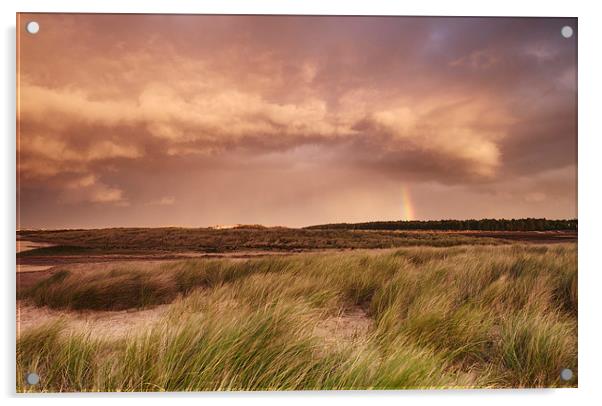 Storm clouds and rainbow at sunset. Holkham, Norfo Acrylic by Liam Grant