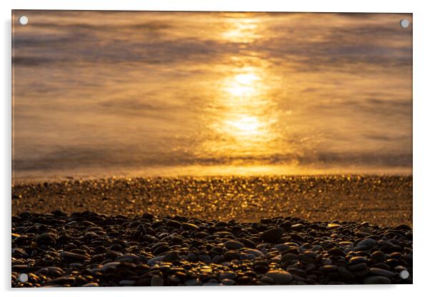 Golden sunlight on sea and pebble beach Acrylic by Phil Crean