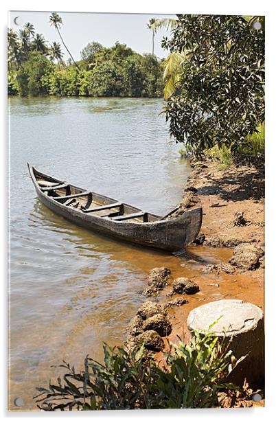 Canoe moored on sandy bank Acrylic by Arfabita  