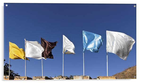 Flags fluttering against blue Sky Acrylic by Arfabita  