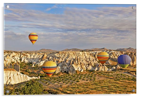 Balloons drifting through Cappadocia gorge Acrylic by Arfabita  