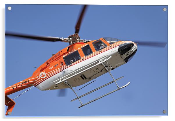 Orange white helicopter hovers over Kashmir Acrylic by Arfabita  