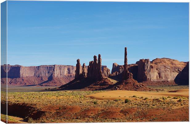 Sand and rocks in Monument Valley, Arizona Canvas Print by Claudio Del Luongo