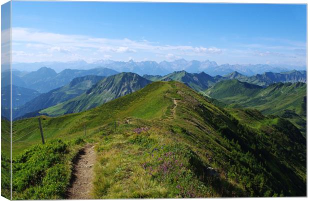 Mountain trail with a view near Damüls, Austria Canvas Print by Claudio Del Luongo