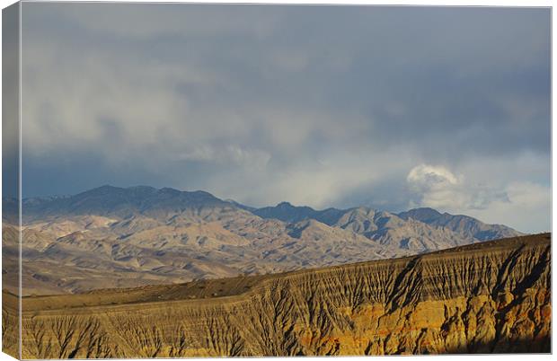 Ubehebe Crater and mountains, Death Valley Canvas Print by Claudio Del Luongo