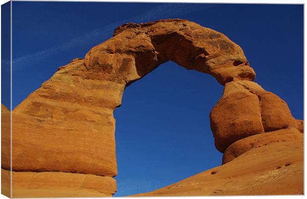 Powerful and gigantic Delicate Arch, Arches Nation Canvas Print by Claudio Del Luongo