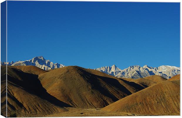 Sierra Nevada behind brown hills Canvas Print by Claudio Del Luongo