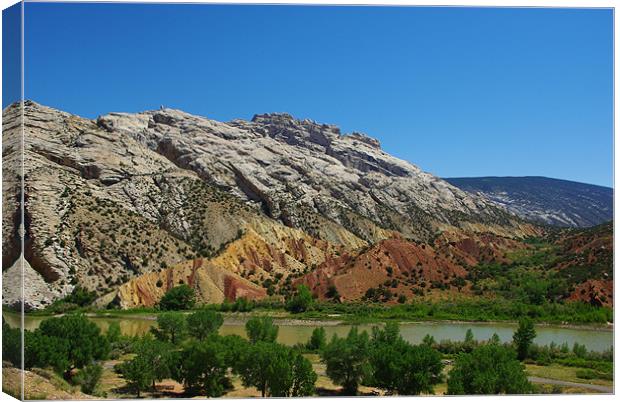 Multicolored river valley, Wyoming Canvas Print by Claudio Del Luongo