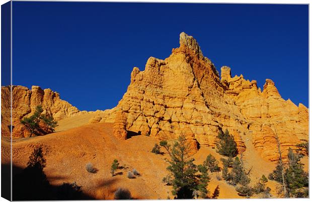 Orange rocks in Casto Canyon, Utah Canvas Print by Claudio Del Luongo