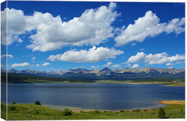 View of Taylor Park Reservoir with Rocky Mountains Canvas Print by Claudio Del Luongo