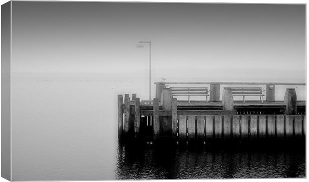 Two benches on a Pier Canvas Print by Sophie Martin-Castex