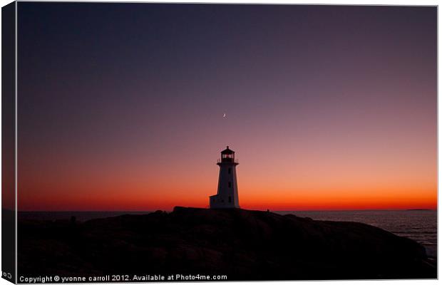 Peggys Cove lighthouse at sunset Canvas Print by yvonne & paul carroll
