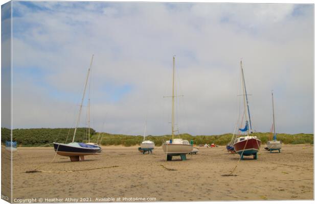 Boats at Beadnell Canvas Print by Heather Athey