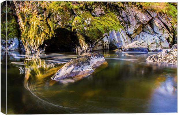 Flowing Water in Fairy Glen Canvas Print by Phil Tinkler