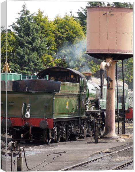           Steam Loco at The Water Tank Canvas Print by Dave Bell