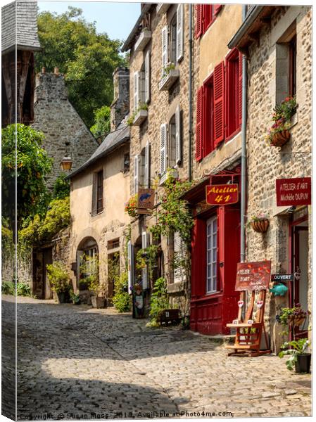 Cobbled street in Dinan Brittany France Canvas Print by Susan Moss