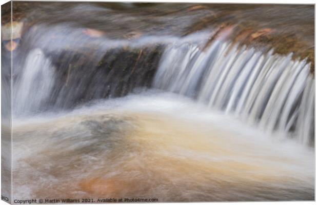 Abstract water flowing in a river Canvas Print by Martin Williams