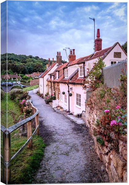 Row of cottages in Sandsend, North Yorkshire Canvas Print by Martin Williams