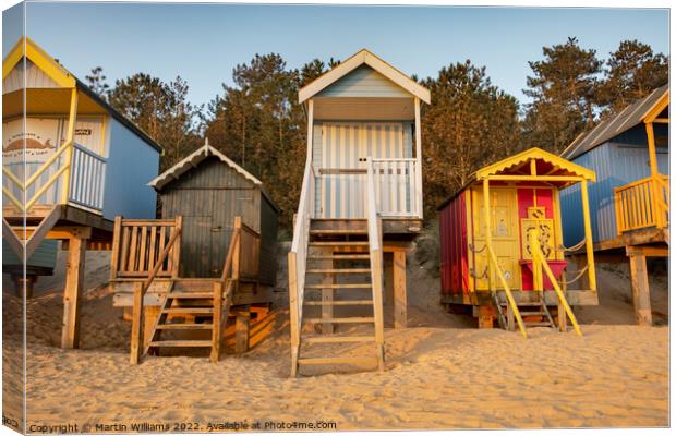 Beach huts at Wells-Next-the-Sea Canvas Print by Martin Williams