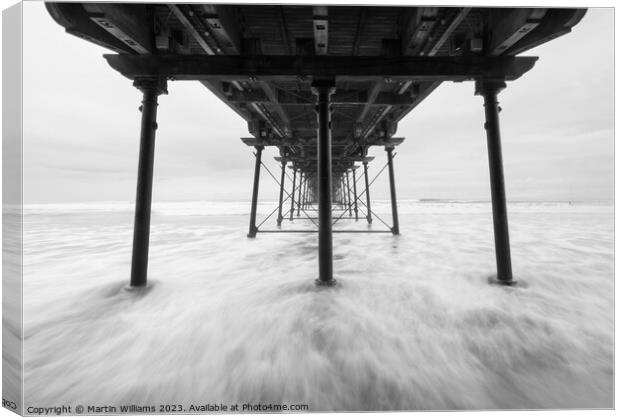 Under the pier at Saltburn by the sea in North Yor Canvas Print by Martin Williams