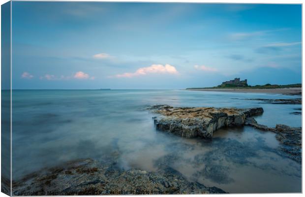 Bamburgh Castle, Northumberland Canvas Print by Martin Williams
