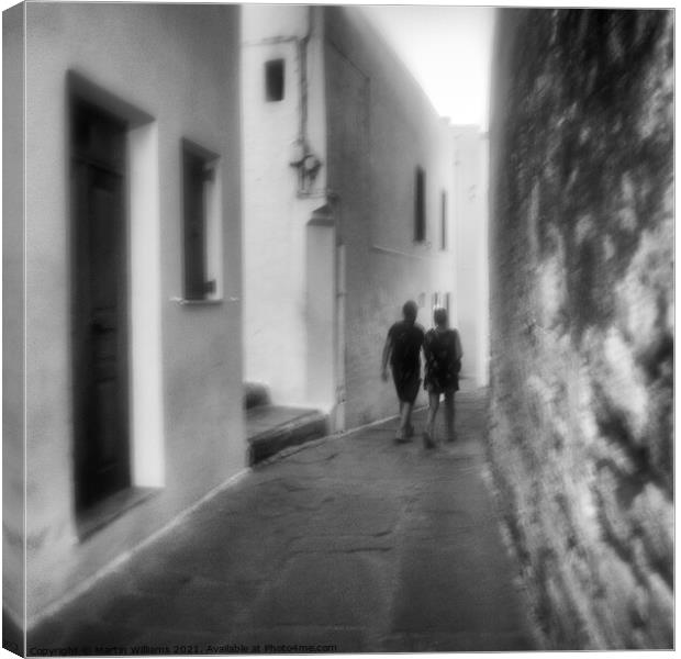 Evening Stroll - Lindos Canvas Print by Martin Williams