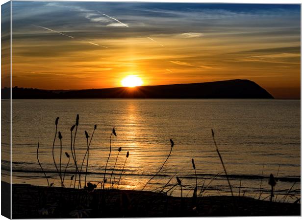 Sunset at Newport Beach, Pembrokeshire, Wales, UK Canvas Print by Mark Llewellyn