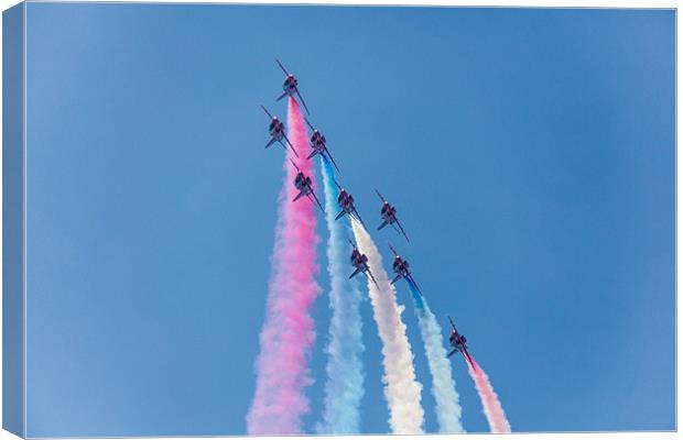 Red Arrows Coloured Roll Canvas Print by Simon West
