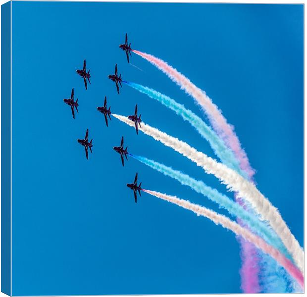 Red Arrows Coloured Roll Canvas Print by Simon West