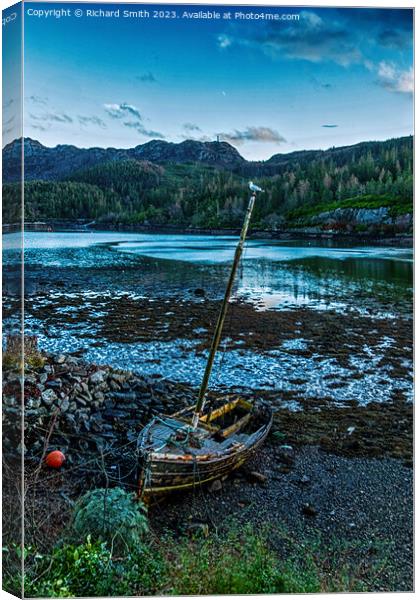 Abandoned wooden dinghy in Loch Carron at Plockton Canvas Print by Richard Smith