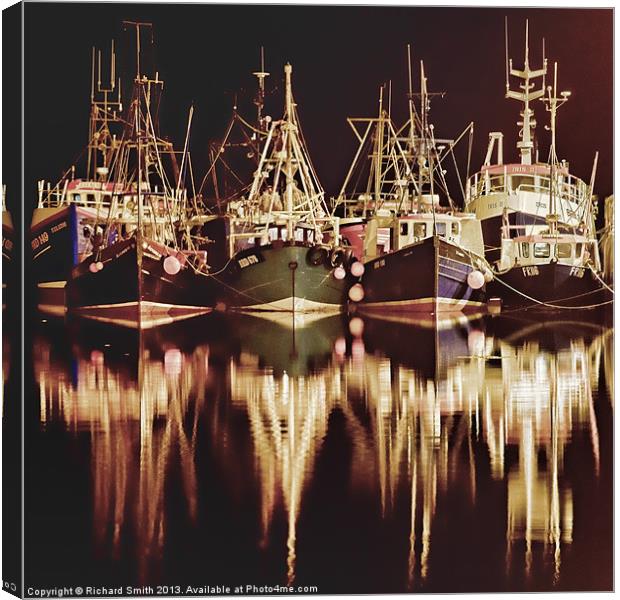 Fishing fleet at Portree pier Canvas Print by Richard Smith