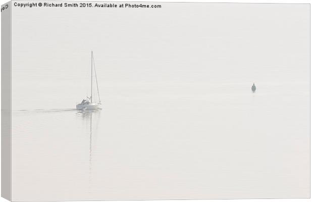  A yacht departs in the mist Canvas Print by Richard Smith
