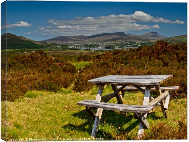 A picnic table with a view Canvas Print by Richard Smith