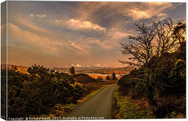 Sunset light illuminates the snow covered Cuillin Canvas Print by Richard Smith